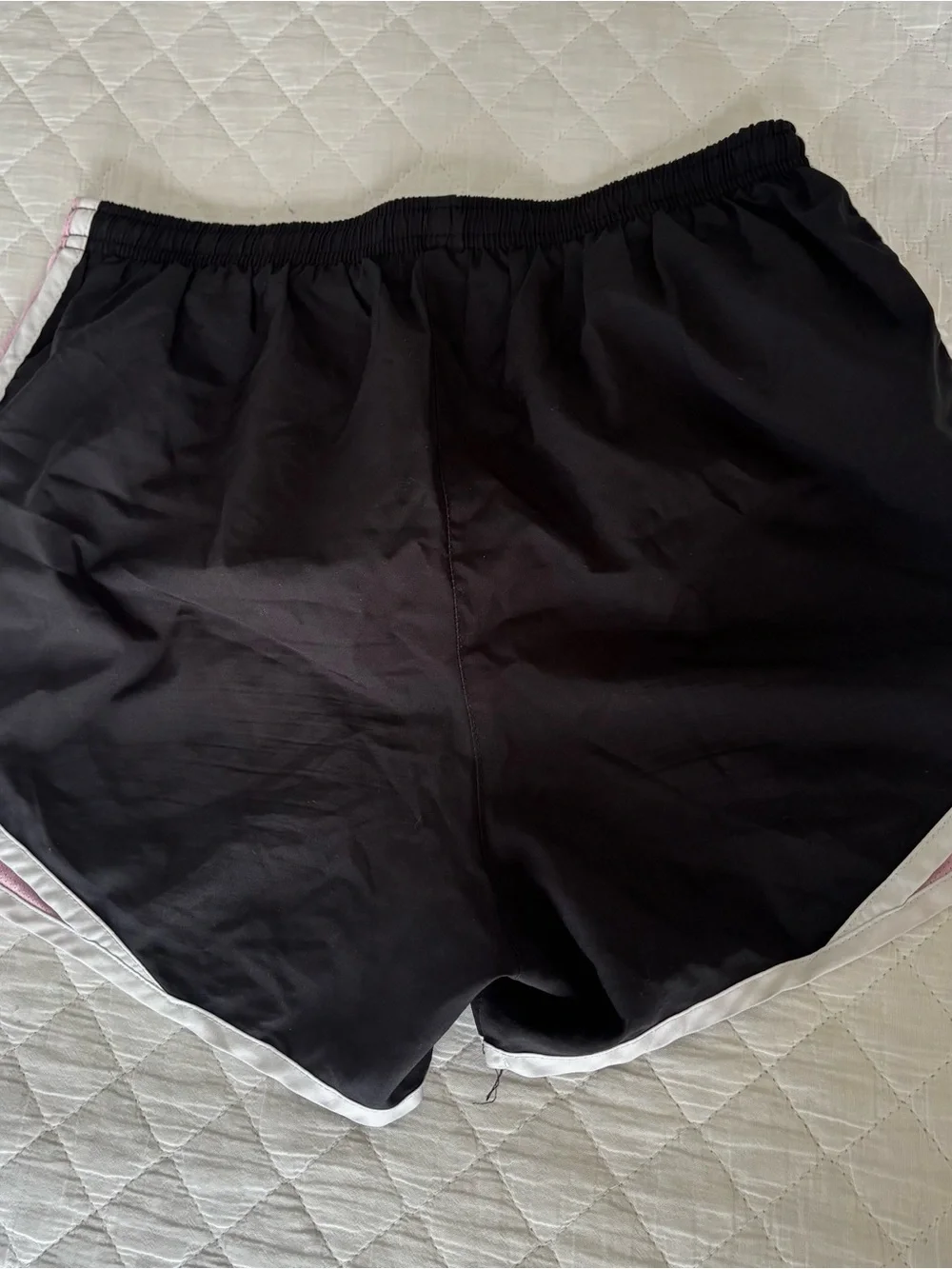 Nike Women’s Black Athletic Shorts with Pink and White Trim